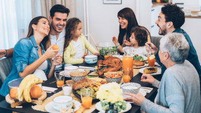 Family gathered around table for holiday meal
